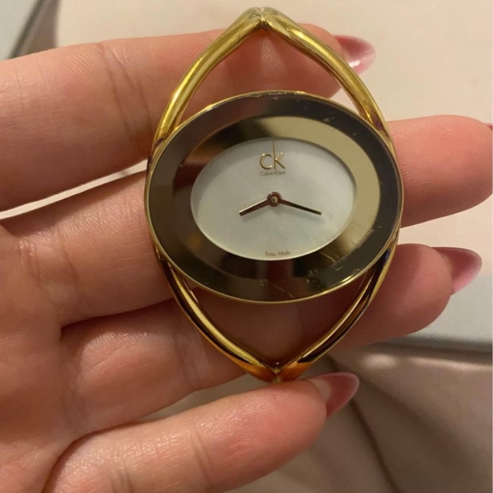 Ck watch color yellow gold - used